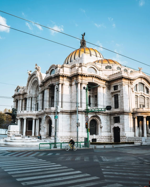 a po of a very large building on the street