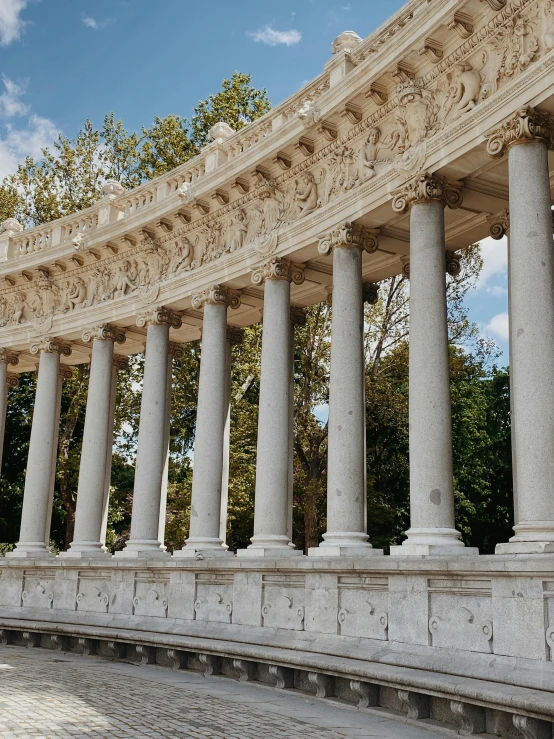 the view shows a row of white columns in a large structure