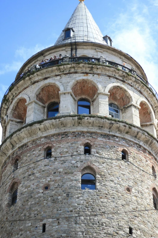 this is a tower with some windows on the top of it