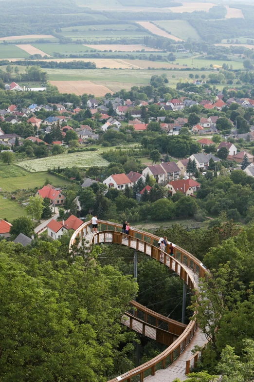 a tall structure made of wood on top of a mountain