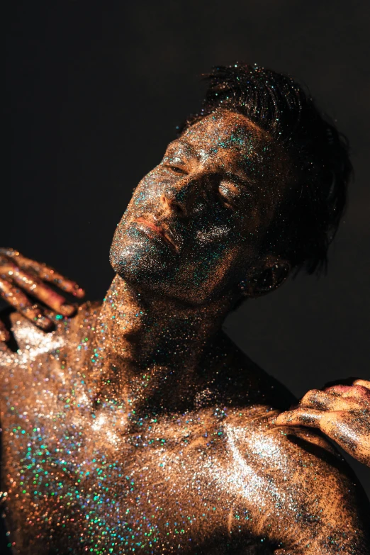 an image of a man covered in glitter