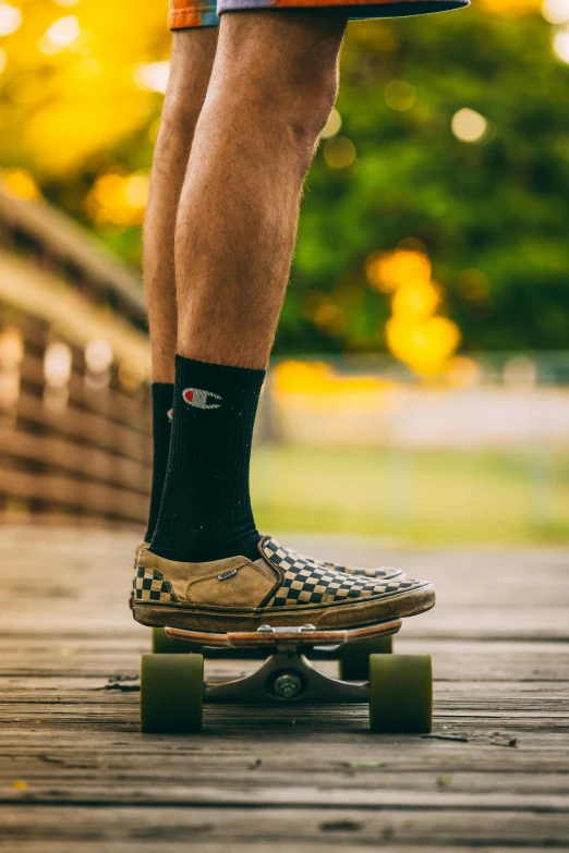 a man riding a skateboard on a walkway