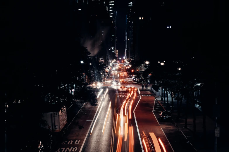 a view down a busy street at night