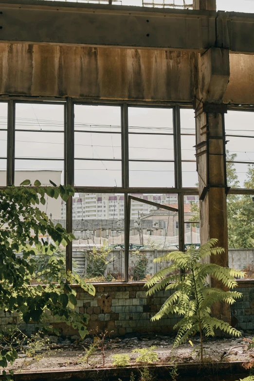 an old building with a clock in the window