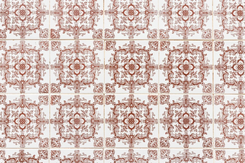 a brown pattern on top of a white wall