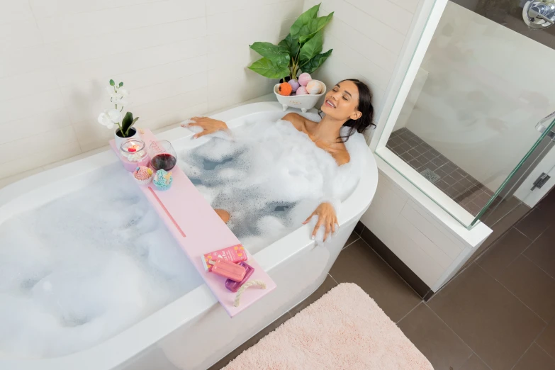 a woman is relaxing in a bubble bath