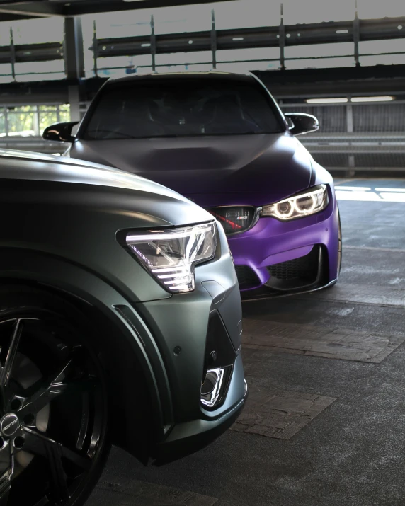 two cars parked in a parking garage