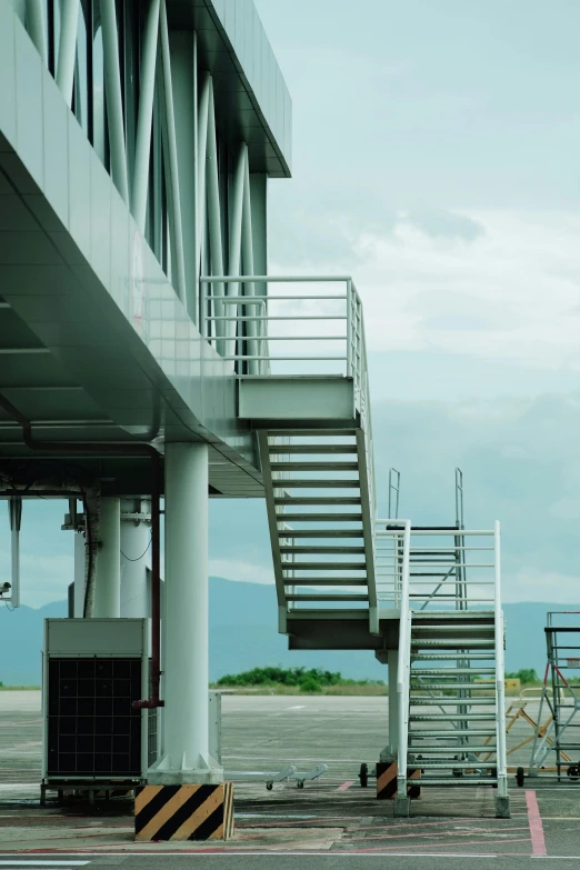 the stairs of an airport have been installed on top of a building