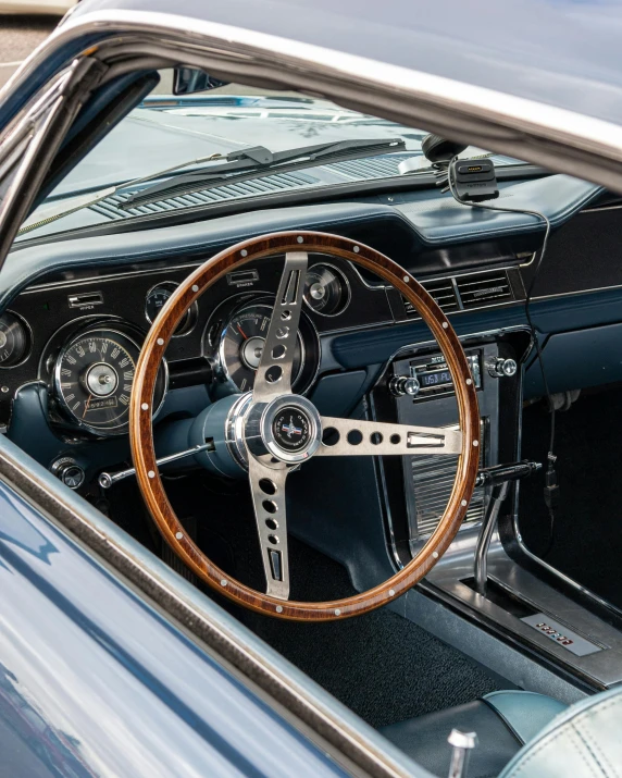 the steering wheel and dashboard of a car