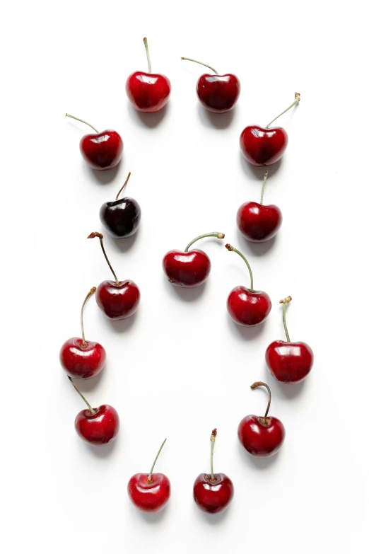 cherries laid out in the shape of a circle