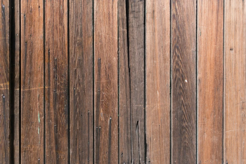 closeup of a fence, dark wood