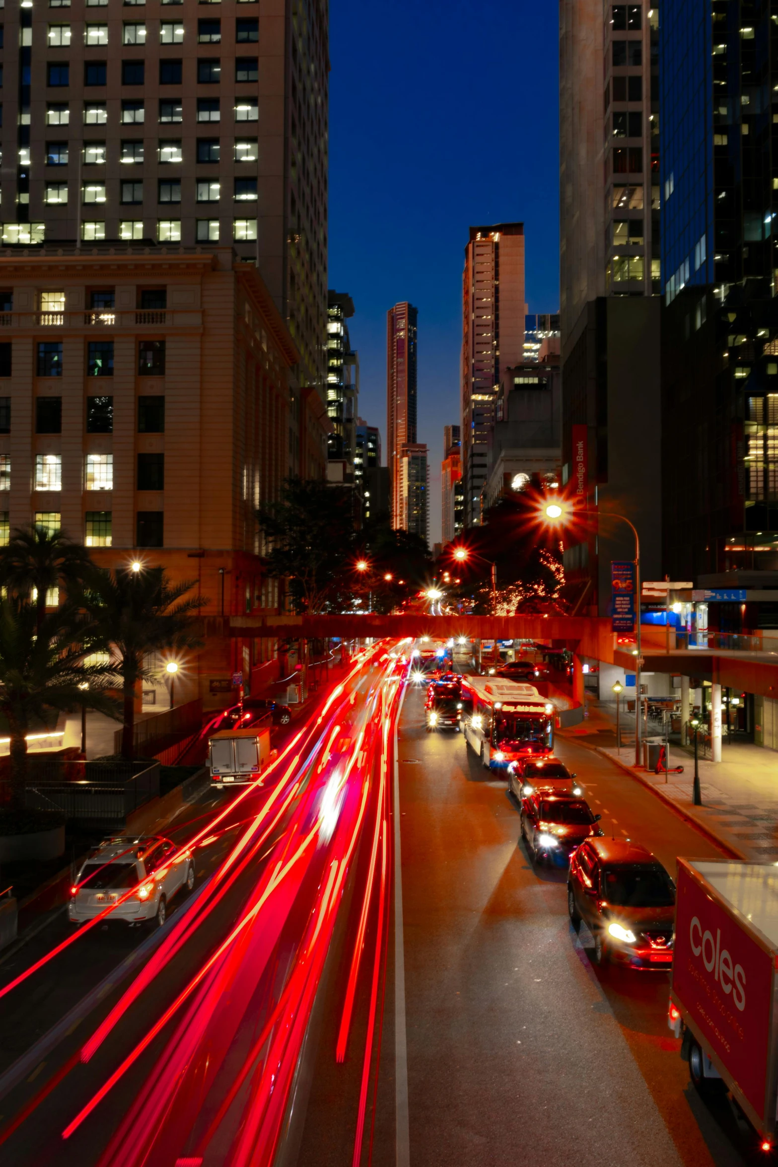 traffic traveling down the highway at night in los angeles