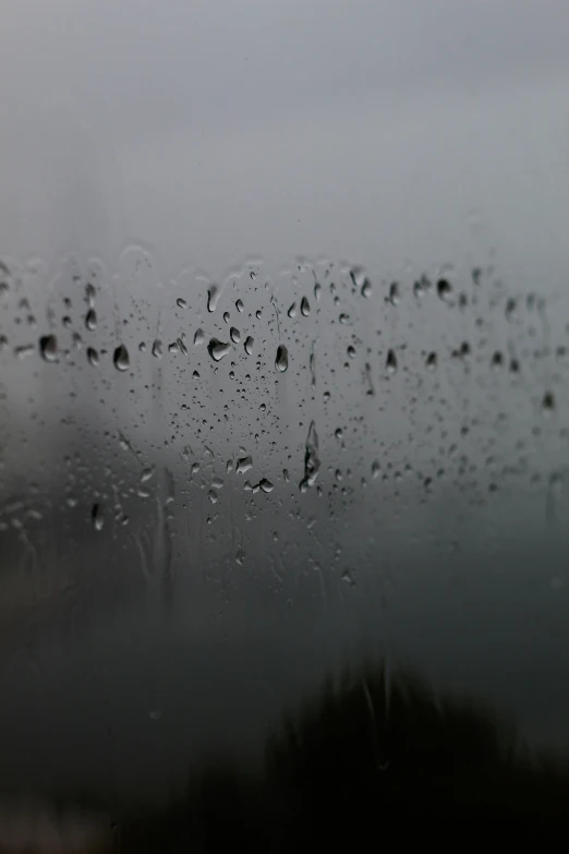 rain drops that are on a window of a car