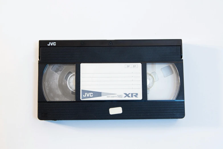 a small video cassette with labels on it