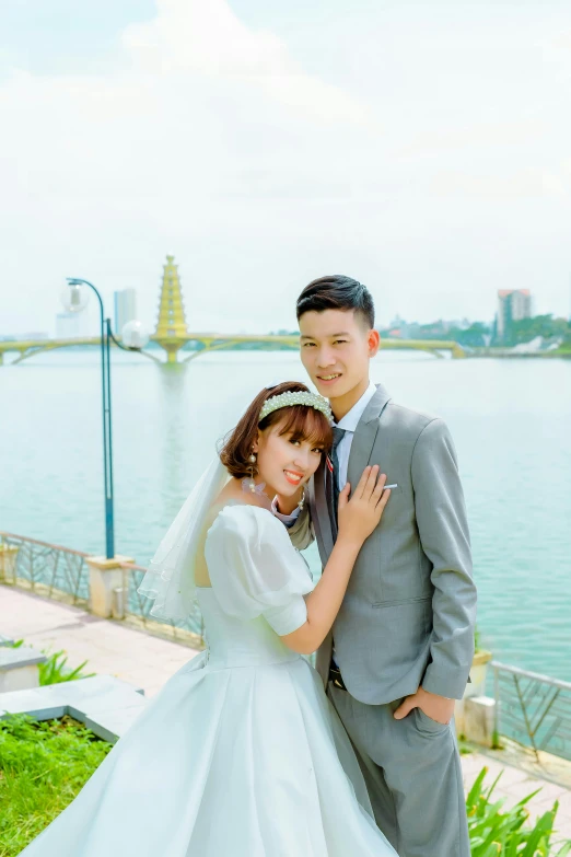 the bride and groom are posing for a po