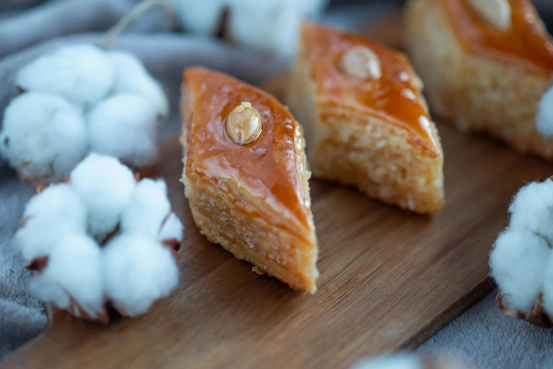 two pastries, covered with some white cotton