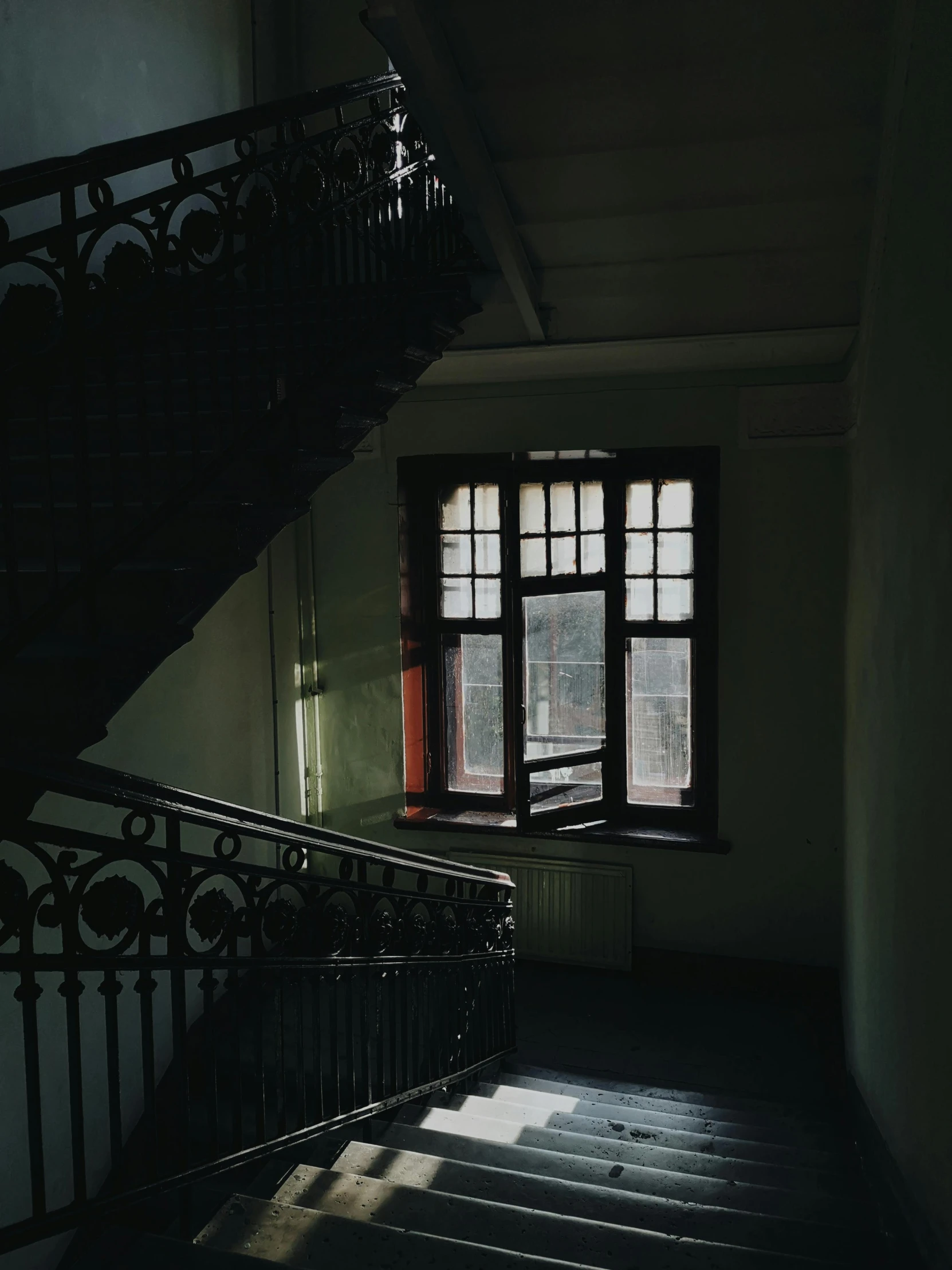 an old staircase in a run down building