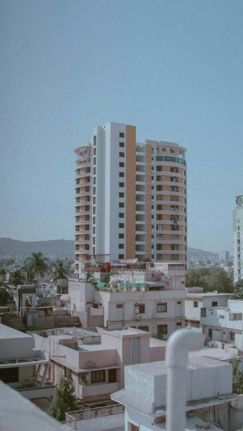 a view of buildings from a rooftop top