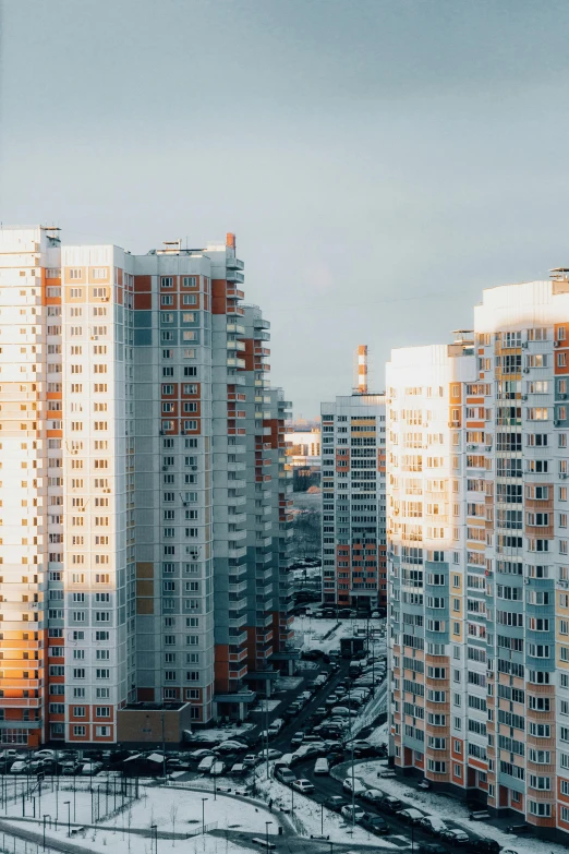 a group of building in a snowy city