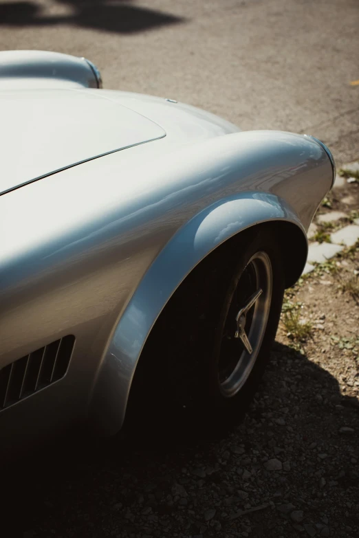 a car parked by the side of a road