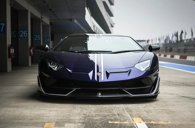 lambrouen parked at the track in a parking garage