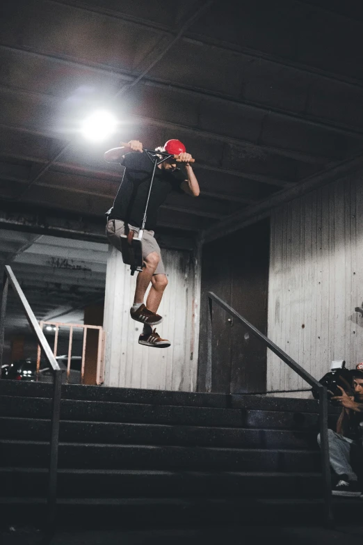 a man flying through the air while riding a skateboard