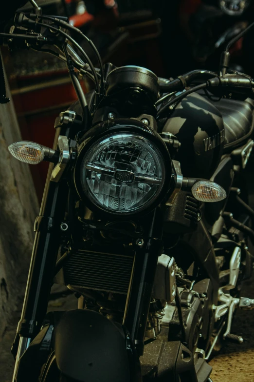 a black and white motorcycle on the road