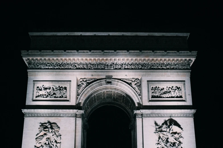 the front side of the large arch lit up in the dark