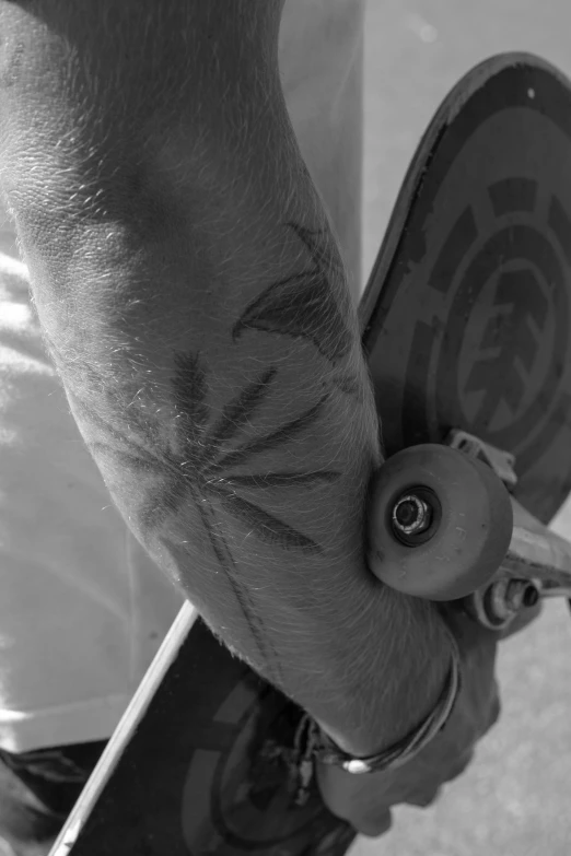 the hand has been drawn on the arm and skateboard