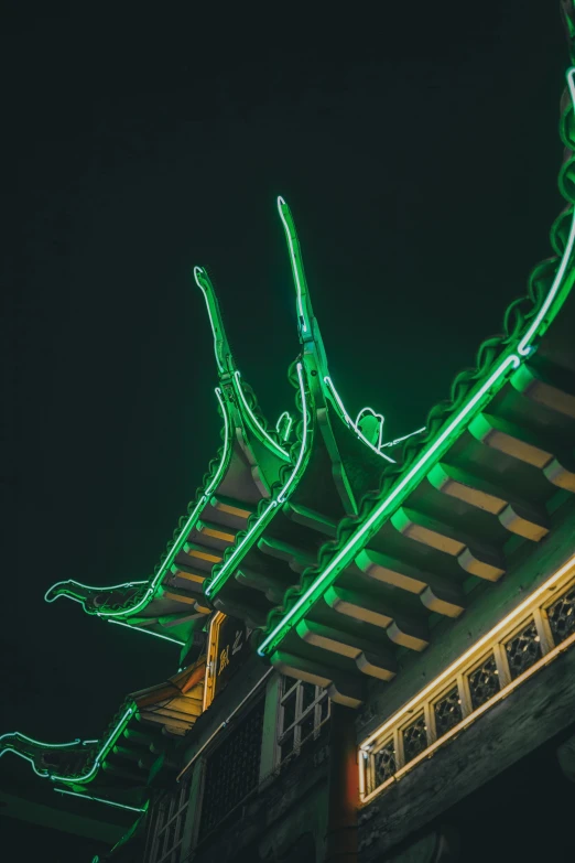 neon signs on the side of a building