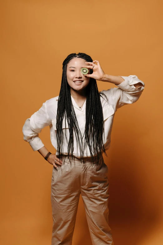  posing for po with small object in her hair