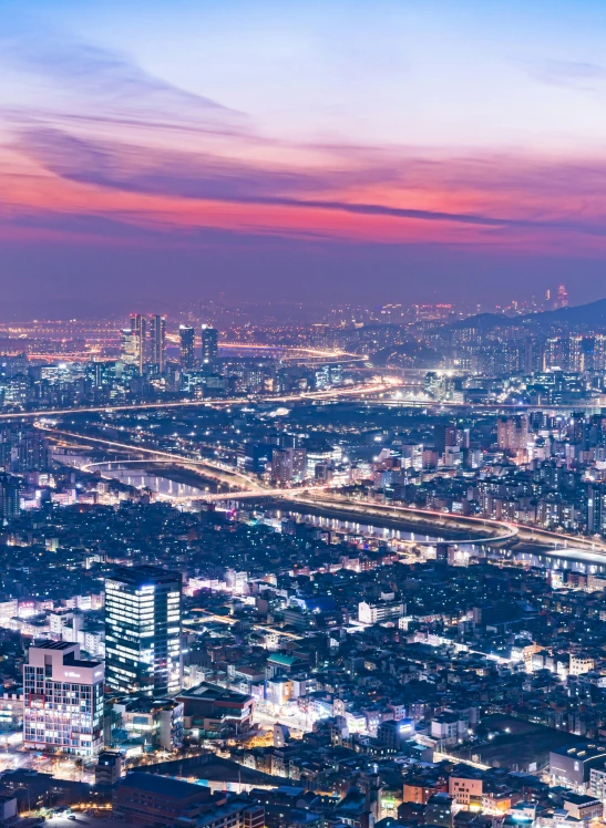 city skyline with large roads in the foreground