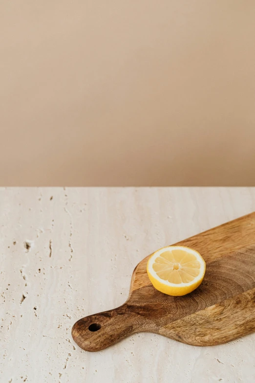 lemon on a  board with white counter