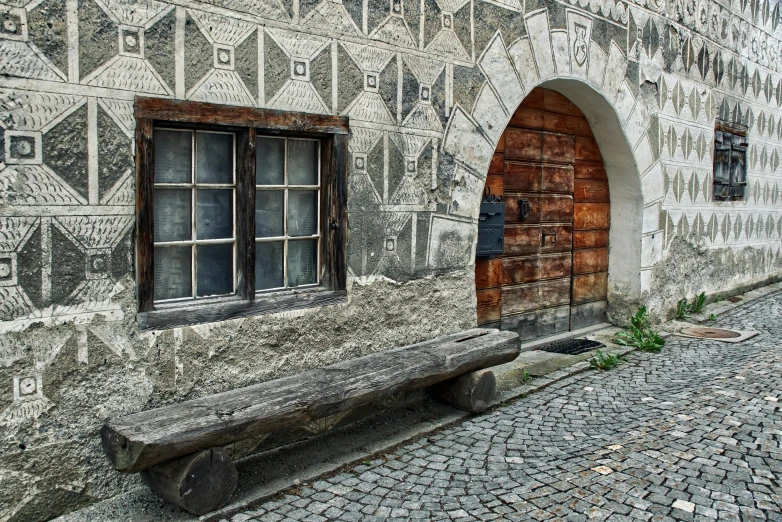 a bench that is in front of a building