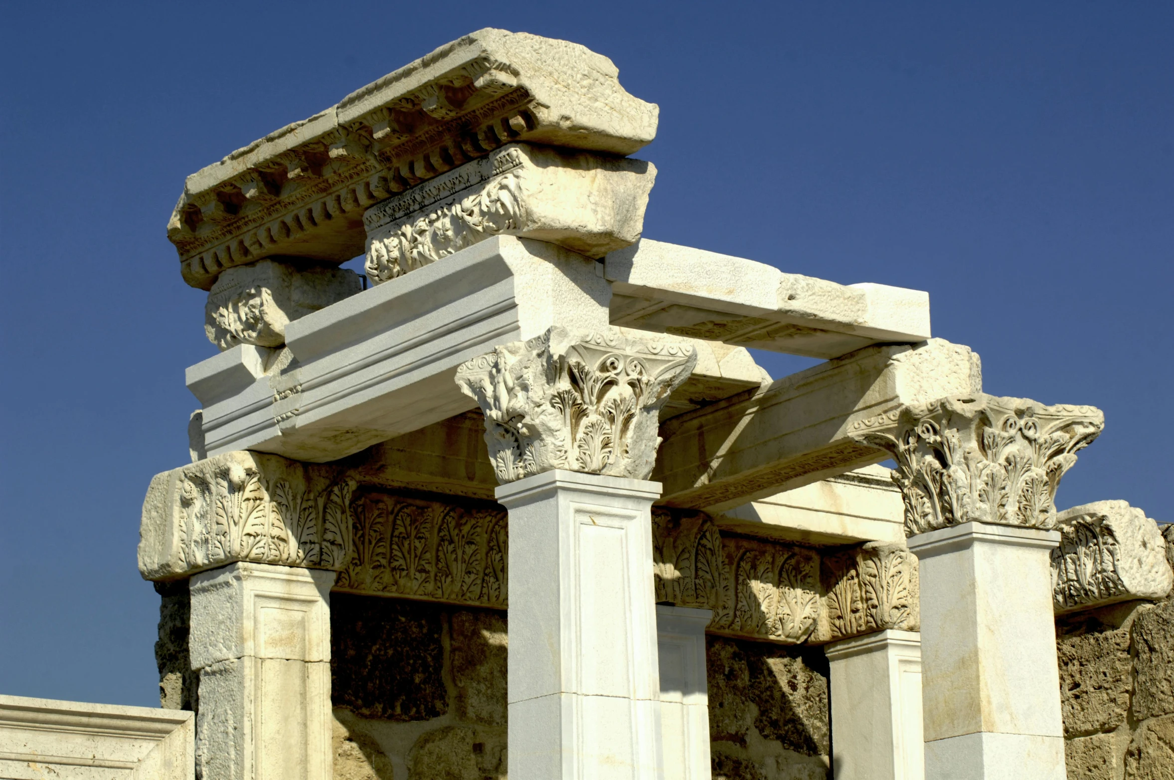 two pillars made out of cement near one another