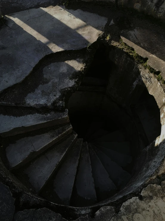 an aerial s of a spiral staircase on top of a building