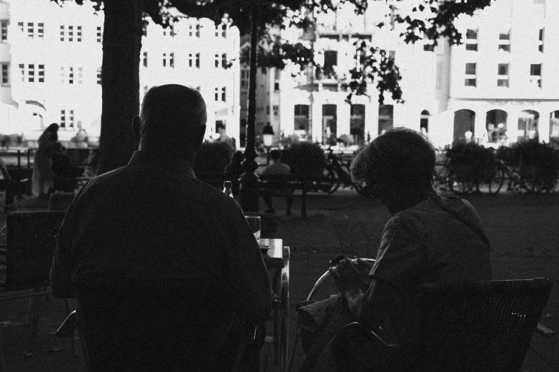 a black and white po of people in a park