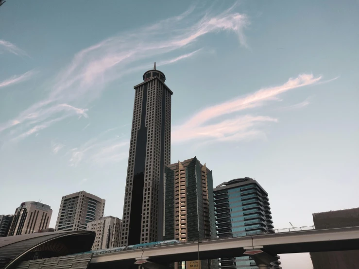 a very tall building with a sky line behind it