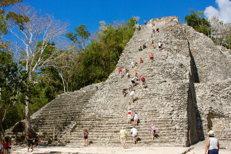 a stone structure with a steep stairway going up it