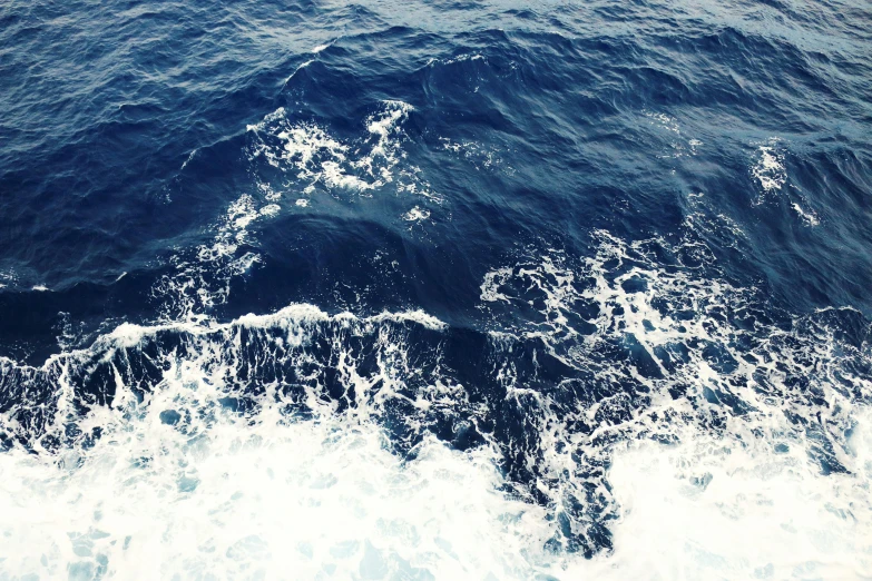 the water is blue and calm next to each other