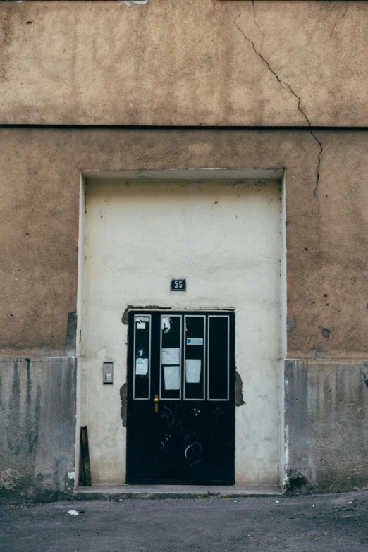 the doorway to a closed door is shown in black