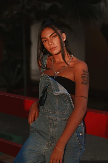 a close up of a person wearing overalls