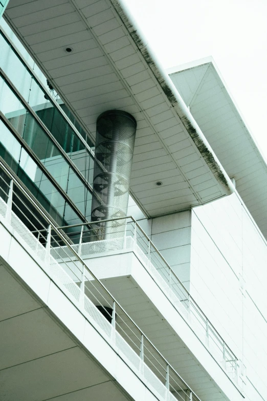 an image of a building that has a clock on the side