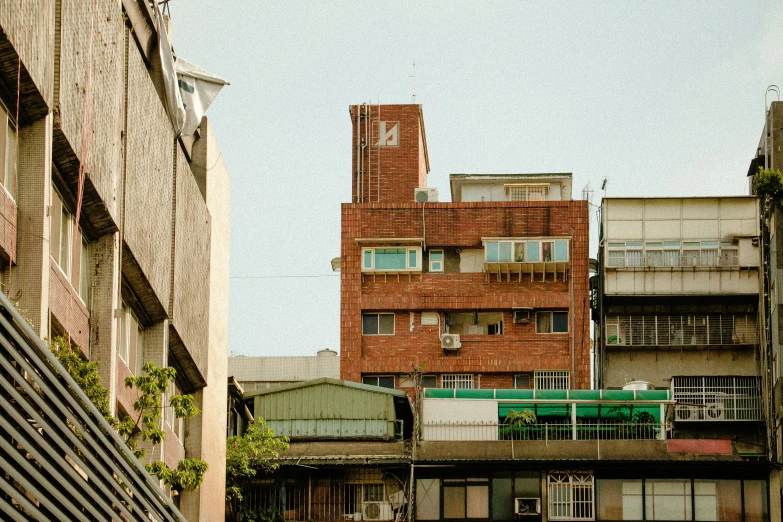 old buildings against an overcast sky in the city