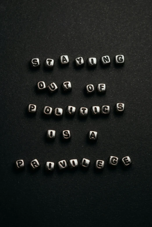 several silver letters that spell out words like q, p, d, e and f