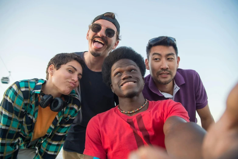 three guys looking and posing for a picture