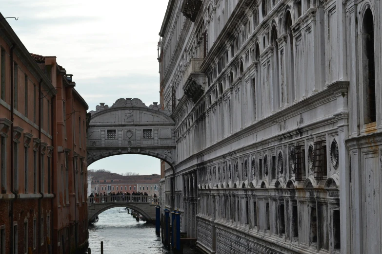 a building with a bridge going up it's side