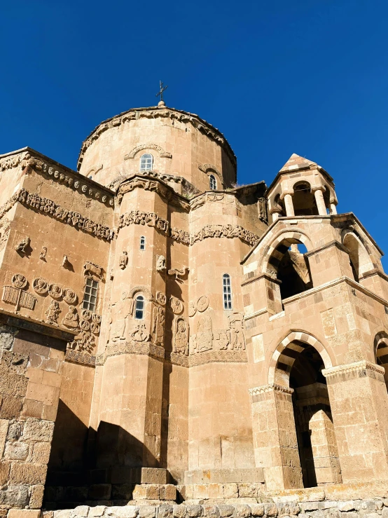 an ornate old building built into the side of the building