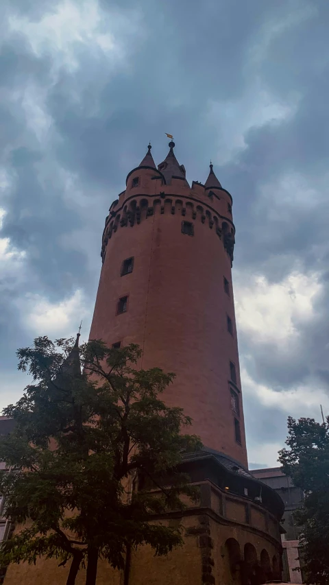 a tall tower with a clock on top of it