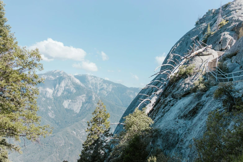 an abandoned path climbs the side of the mountain